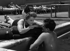 Florence (Sally Forrest) with Gordon (Robert Clarke) at the pool in ‪Hard, Fast And Beautiful